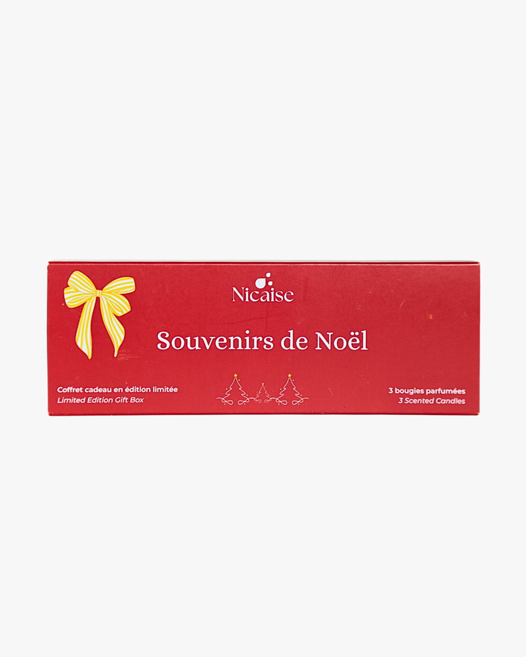 Boîte du coffret cadeau Nicaise « Souvenirs de Noël » (édition limitée), pour 3 bougies parfumées, sur fond blanc.
