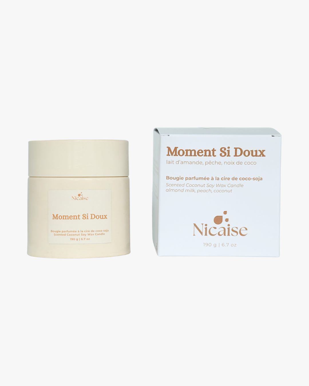 Bougie parfumée Nicaise « Moment Si Doux » en pot avec couvercle et sa boîte d’emballage, 190 g, sur fond blanc.
